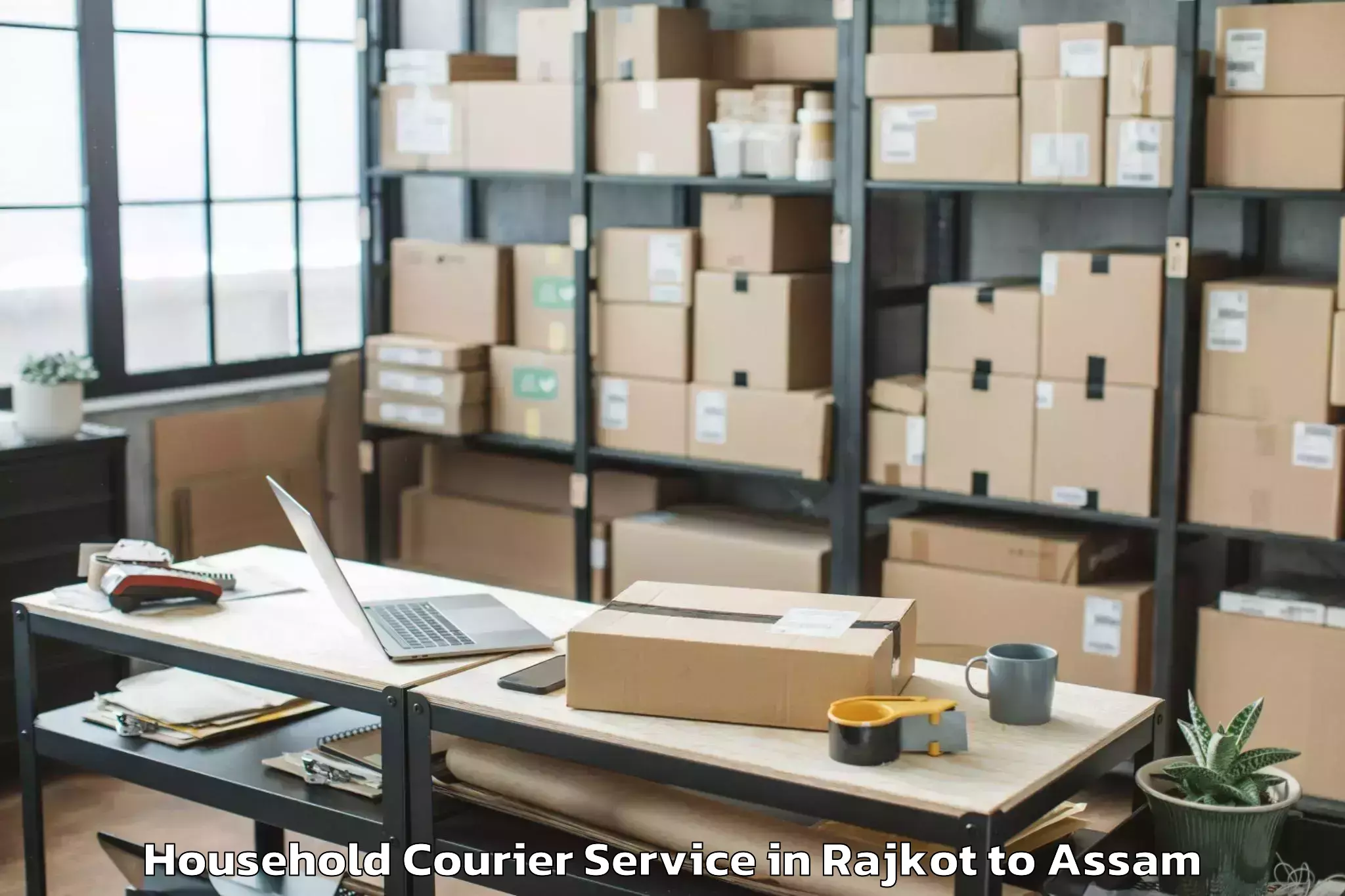 Quality Rajkot to Dhakuakhana Household Courier